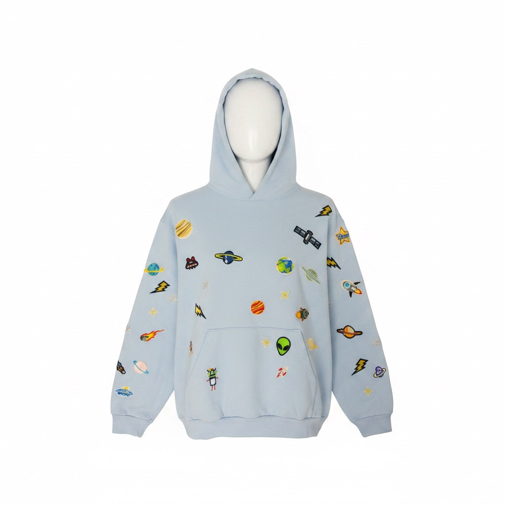A Brand Called California light blue 100% cotton unisex hoodie with embroidered space-themed patches like planets, aliens, rockets, and satellites.