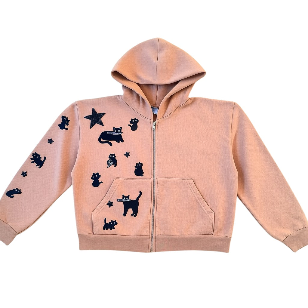 A Brand Called California peach cropped zip-up hoodie with black cat appliques and a black star applique.